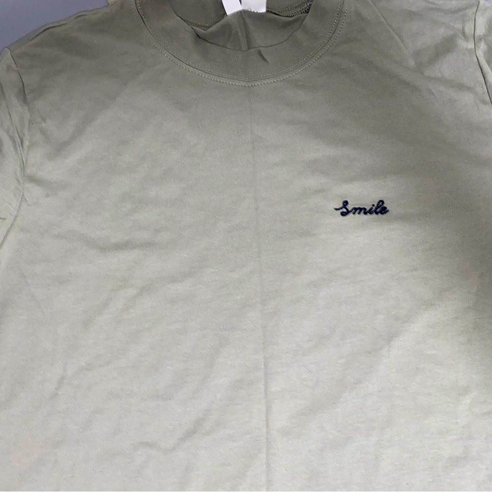 New sage green “smile” tee from H&M